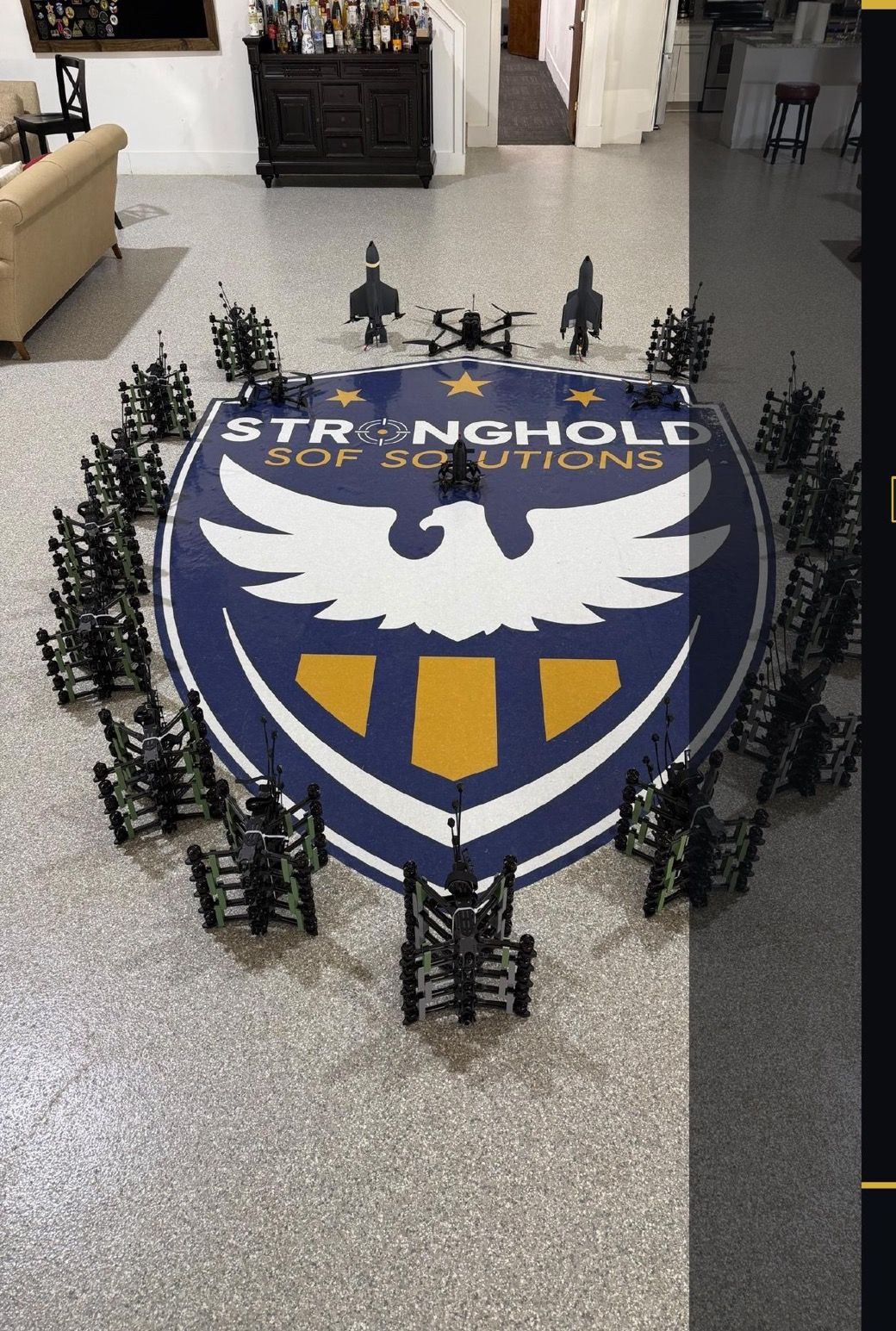Small unmanned aircraft arranged on the Stronghold floor mark